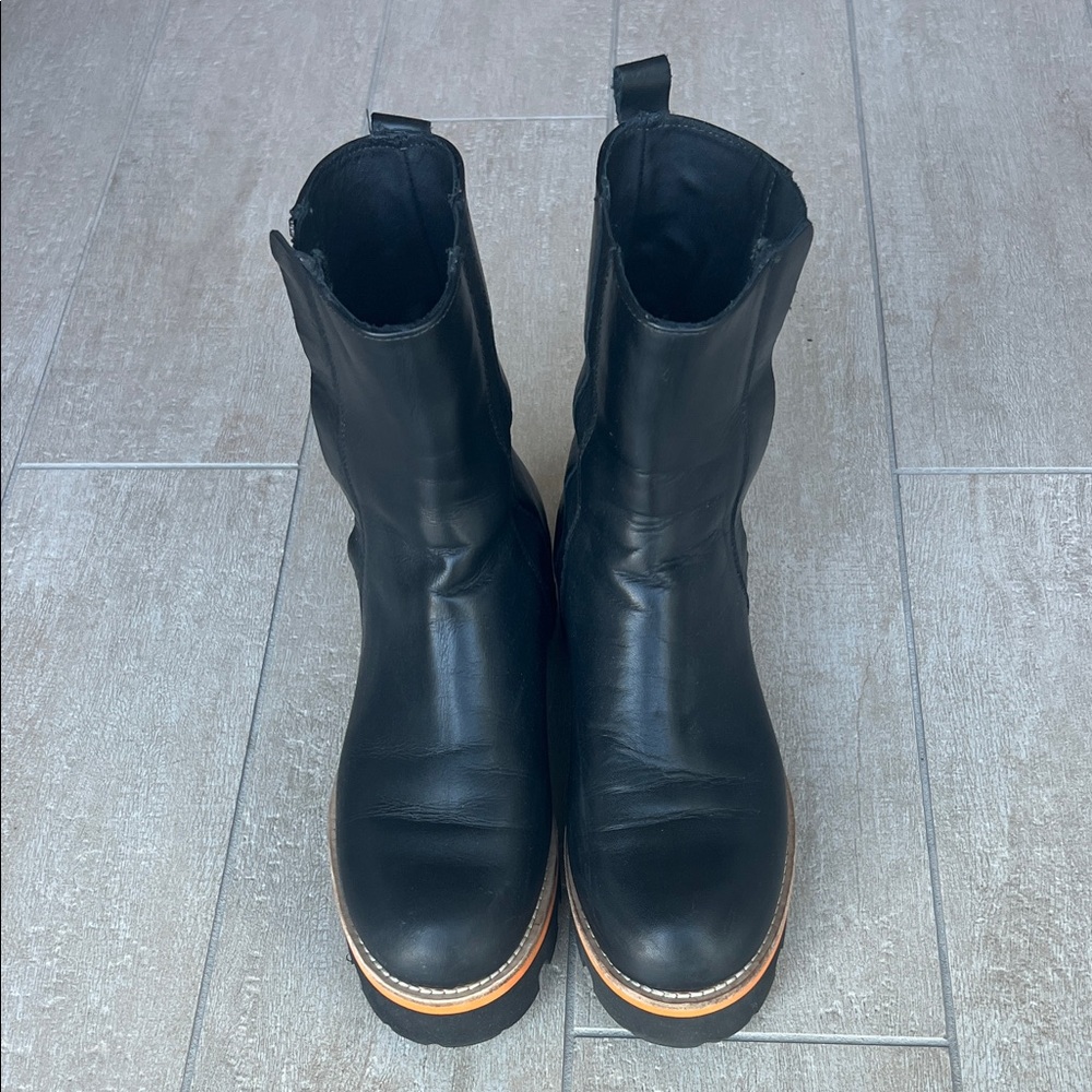 Sleek Black Ankle Boots with Tan Sole